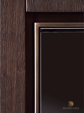 Close-up of custom dark wood furniture frame and inset detail, showcasing fine finishing craftsmanship.